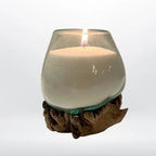 candela su vaso in Vetro fuso su legno